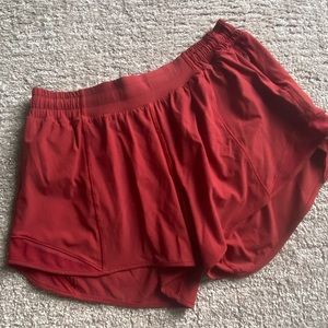 Lululemon Hotty Hot Shorts size 8 tall in Rust